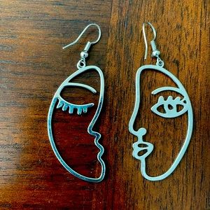 Two Faces dangle earrings